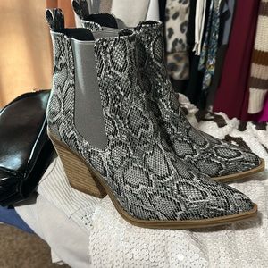 Snakeskin ankle bootie